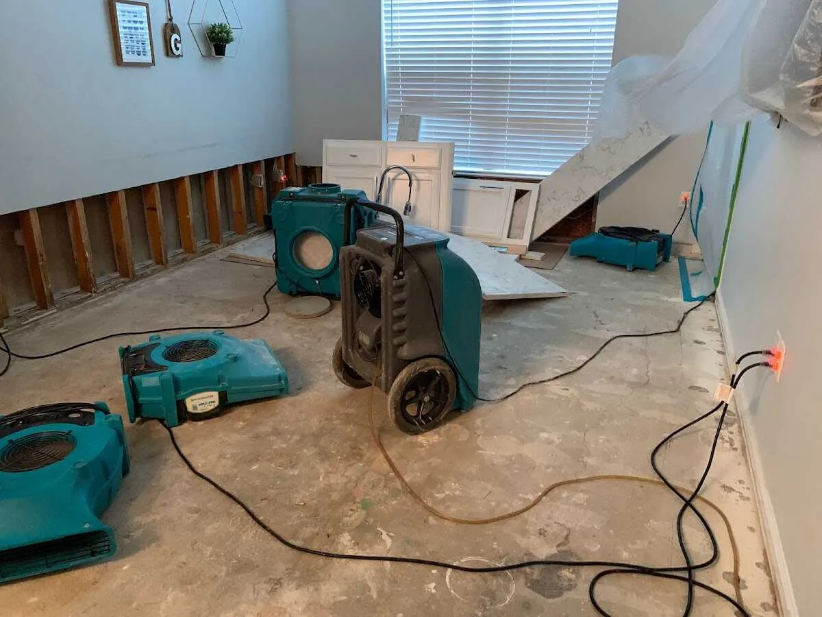 Dehumidifier in flood-cut room for Water Damage Restoration in Pilot Point